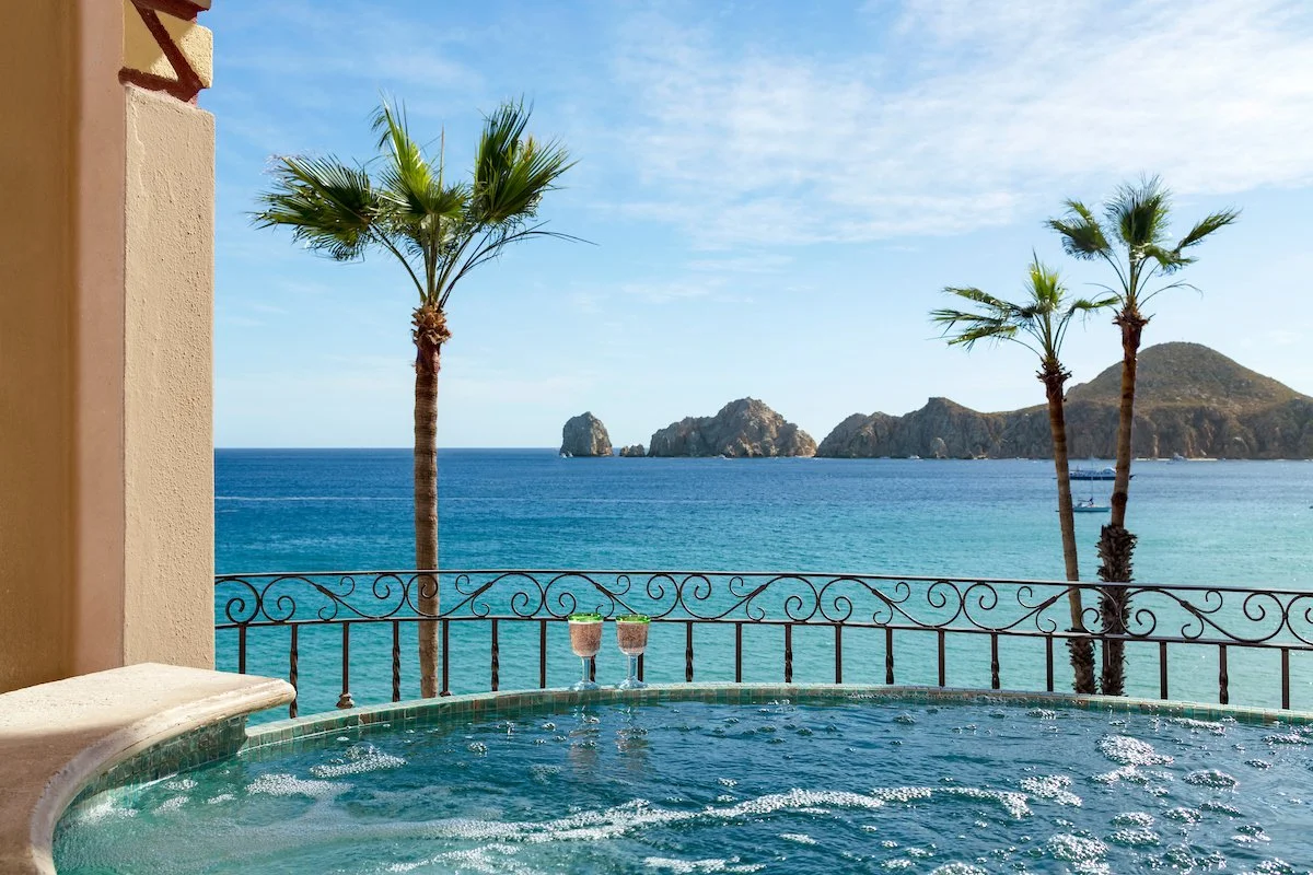 Private jacuzzi overlooking Sea of Cortez with palm trees