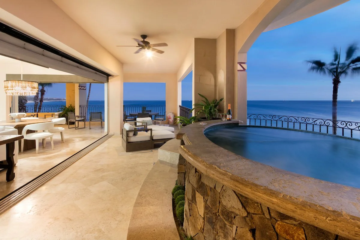 Terrace at twilight with jacuzzi and ocean views